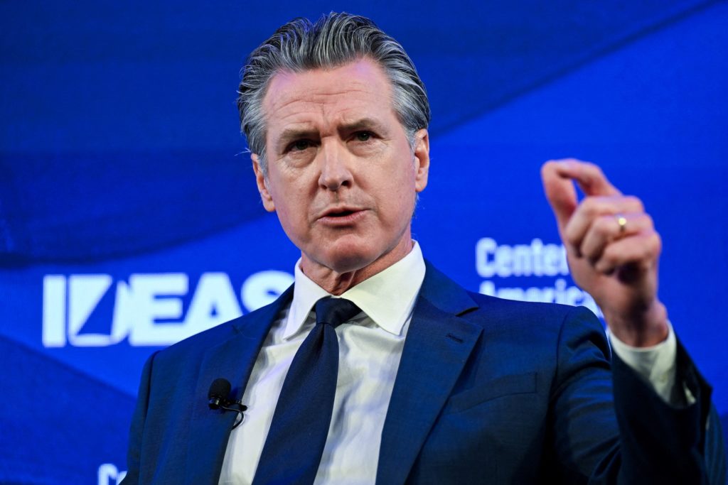 Source-feed image associated with News Wrap: Newsom says Trump ordering DOJ to investigate him and wife
