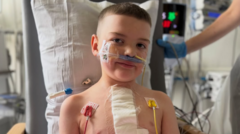 Source-feed image associated with Boy who inspired organ donation law in NI gets new heart after 8-year wait