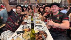 Source-feed image associated with Giant banquets rile radical left in France