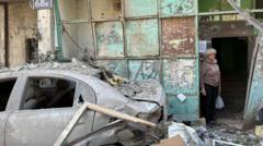 Source-feed image associated with 'They'll fix the building, but not our souls': Sleepy Kyiv neighbourhood hit in Russian strike