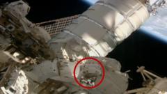 Source-feed image associated with Watch: Nasa astronauts conduct 6.5-hour spacewalk outside ISS
