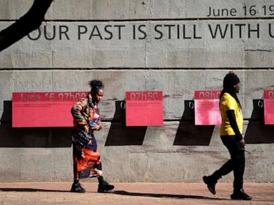Source-feed image associated with South Africa marks 50 years since Soweto uprising, but challenges linger