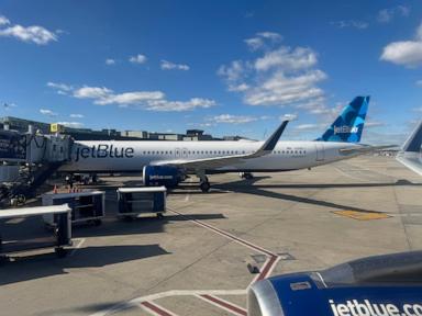 Source-feed image associated with JetBlue flight reports striking drone while landing at JFK