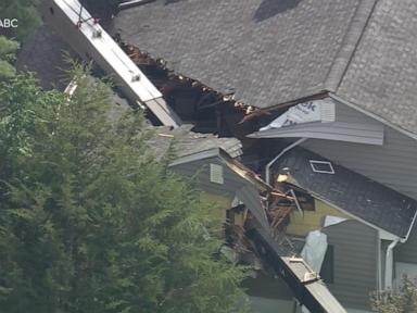 Source-feed image associated with WATCH: Large crane collapses onto New Jersey homes