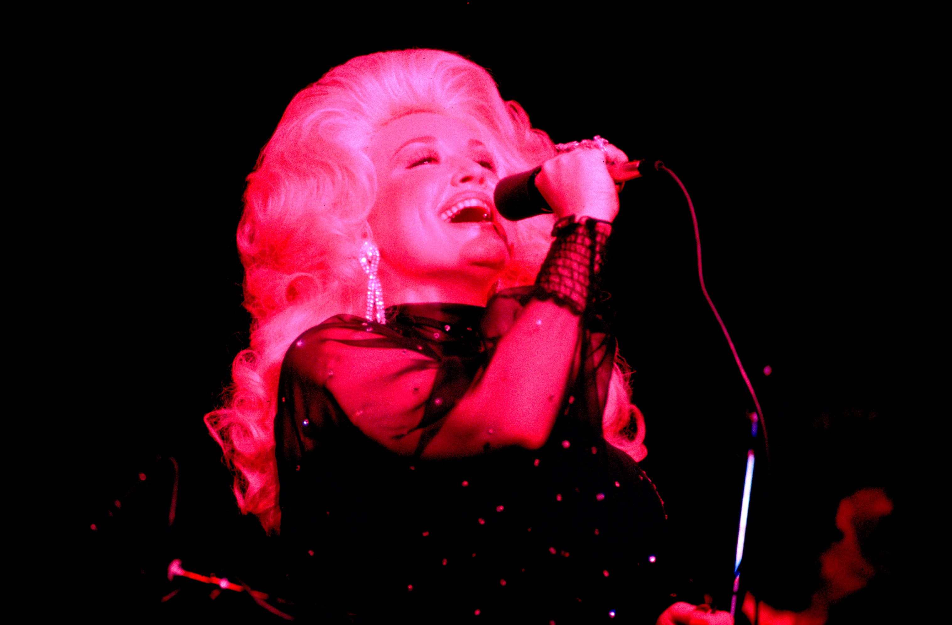 Source-feed image associated with Dolly Parton Isn’t Going Anywhere