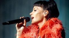 Source-feed image associated with Lily Allen defends tour after some fans criticise show length