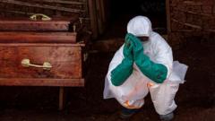 Source-feed image associated with Three Ebola vaccines in development amid growing outbreak fears