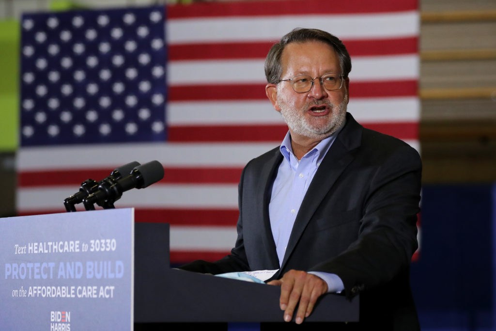 Source-feed image associated with Michigan Sen. Gary Peters backs Haley Stevens in contentious race to succeed him