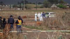 Image from linked report: Two charged with woman's murder as South Africa police investigate eight other body finds