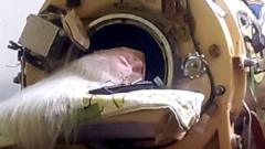 Source-feed image associated with Hours each day in an iron lung kept her breathing, her will to live kept her alive