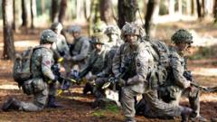 Source-feed image associated with British army told to stop non-essential training exercises to save money