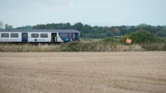 Source-feed image associated with Man dies after train hits van on level crossing