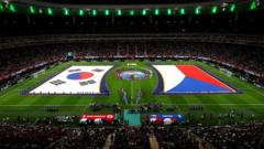 Source-feed image associated with Man apologises for making racist gesture at Korean in World Cup match