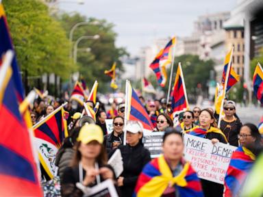 Image from linked report: Protesters of Xi's policies push for change in earshot of White House visit with Trump