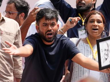 Source-feed image associated with India's Cockroach Party supporters bang plates to call for education minister's resignation