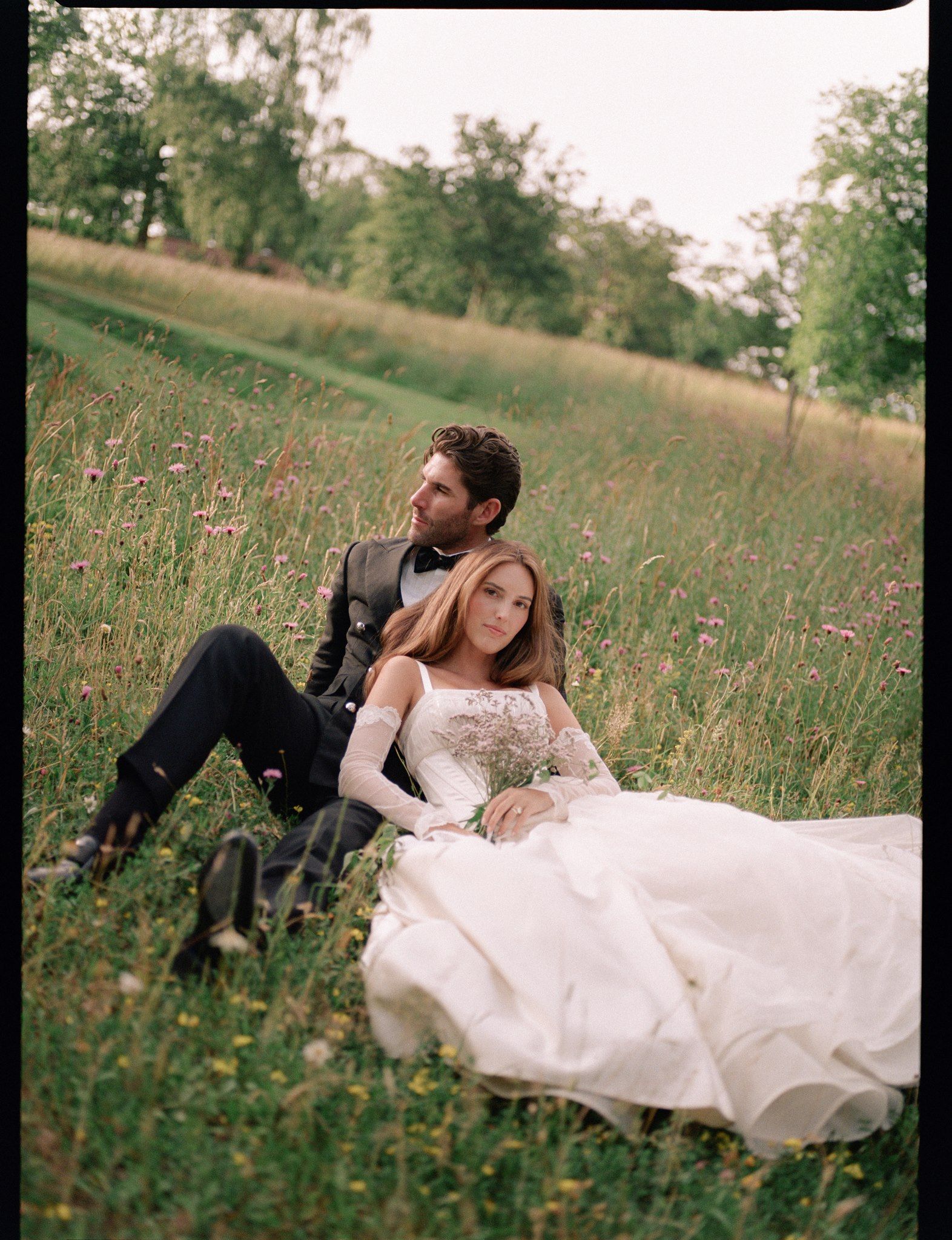 Source-feed image associated with The Bride Wore 7 Bespoke Looks Designed by Her Sister to Her English Countryside Wedding