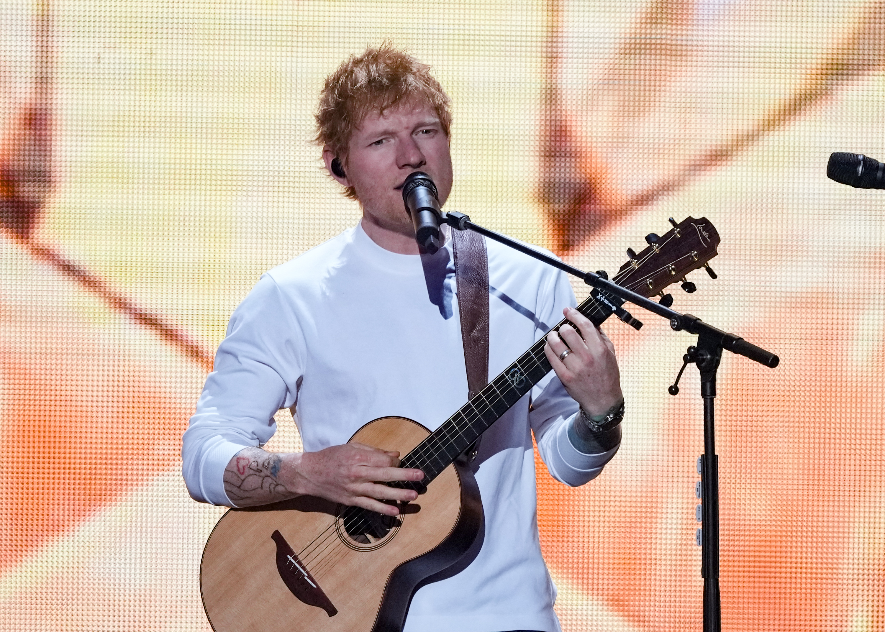 Image from linked report: Ed Sheeran Addresses Macklemore Controversy While on Stage at First Concert Since Rapper Dropped From Tour: ‘What Is Happening in Gaza Is Catastrophic and Unjustifiable’