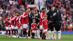 Source-feed image associated with Sons of officer who died in A66 crash lead out Man Utd as mascots