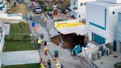 Source-feed image associated with Watch: Sinkhole at Nicolas Cage's Malibu house swallows driveway