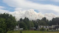 Source-feed image associated with Residents allowed to return after Cairngorms wildfire evacuation