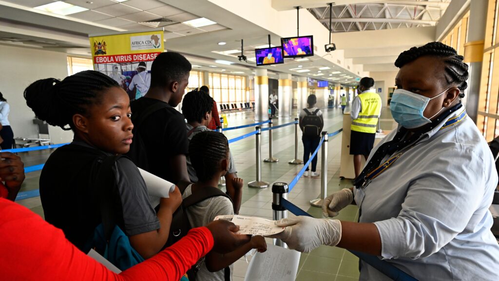Source-feed image associated with Opinion: If Americans risk their lives fighting Ebola overseas, they deserve the right to come home