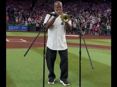 Image from linked report: WATCH: David Muir shares moment quick-thinking trumpeter saves anthem performance