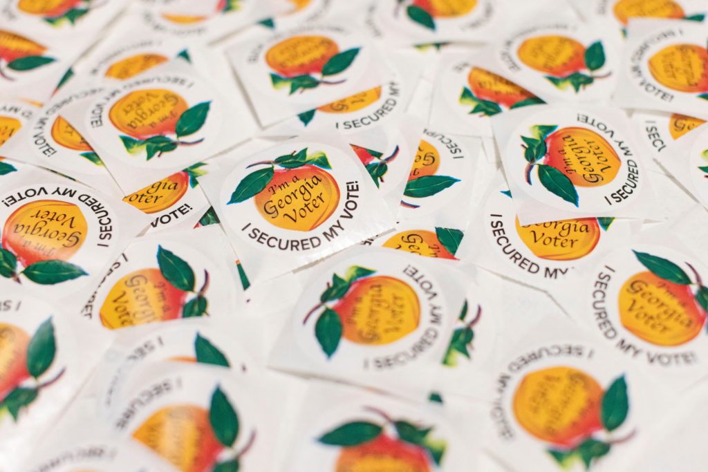 Source-feed image associated with Georgia's vote-counting method will soon be banned. Lawmakers will try to find a fix this week