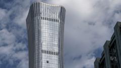 Source-feed image associated with China says pilot crashed small plane into skyscraper for 'personal reasons'