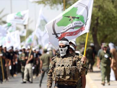 Source-feed image associated with Powerful Iran-backed Iraqi militia says it will start handing its weapons to the state