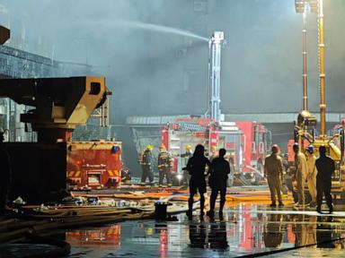 Source-feed image associated with A shoe factory fire that killed 28 highlights China's persisting worker safety risks