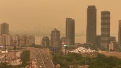 Source-feed image associated with Orange haze from Canada wildfires seen in Ontario and northern US