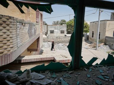 Source-feed image associated with Women gathered in a small Iranian town for a wedding. Then deadly strikes hit