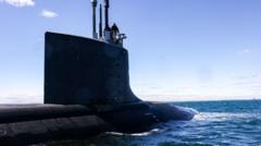 Source-feed image associated with Australian ex-minister launches crowd-funded inquiry into Aukus submarine deal