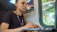 Source-feed image associated with Britain's onboard train wi-fi is one of Europe's worst. This is how people manage