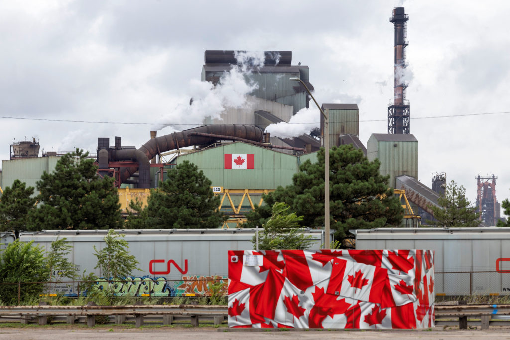 Source-feed image associated with Untested in court, Trump's new tariffs on Canada raise legal questions