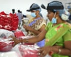 Source-feed image associated with ‘Who is going to pay us when we’re replaced by robots?’ The Indian factory workers told to film themselves for AI