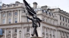 Image from linked report: 'All options' considered for Banksy's flag statue