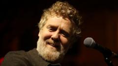 Source-feed image associated with Public wake to be held for musician Glen Hansard