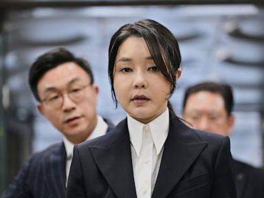 Source-feed image associated with South Korean court sentences ex-first lady Kim to 7 years for taking luxury gifts