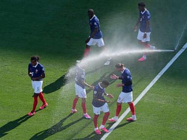 Source-feed image associated with Eastern heat on July 4 threatens World Cup players and fans