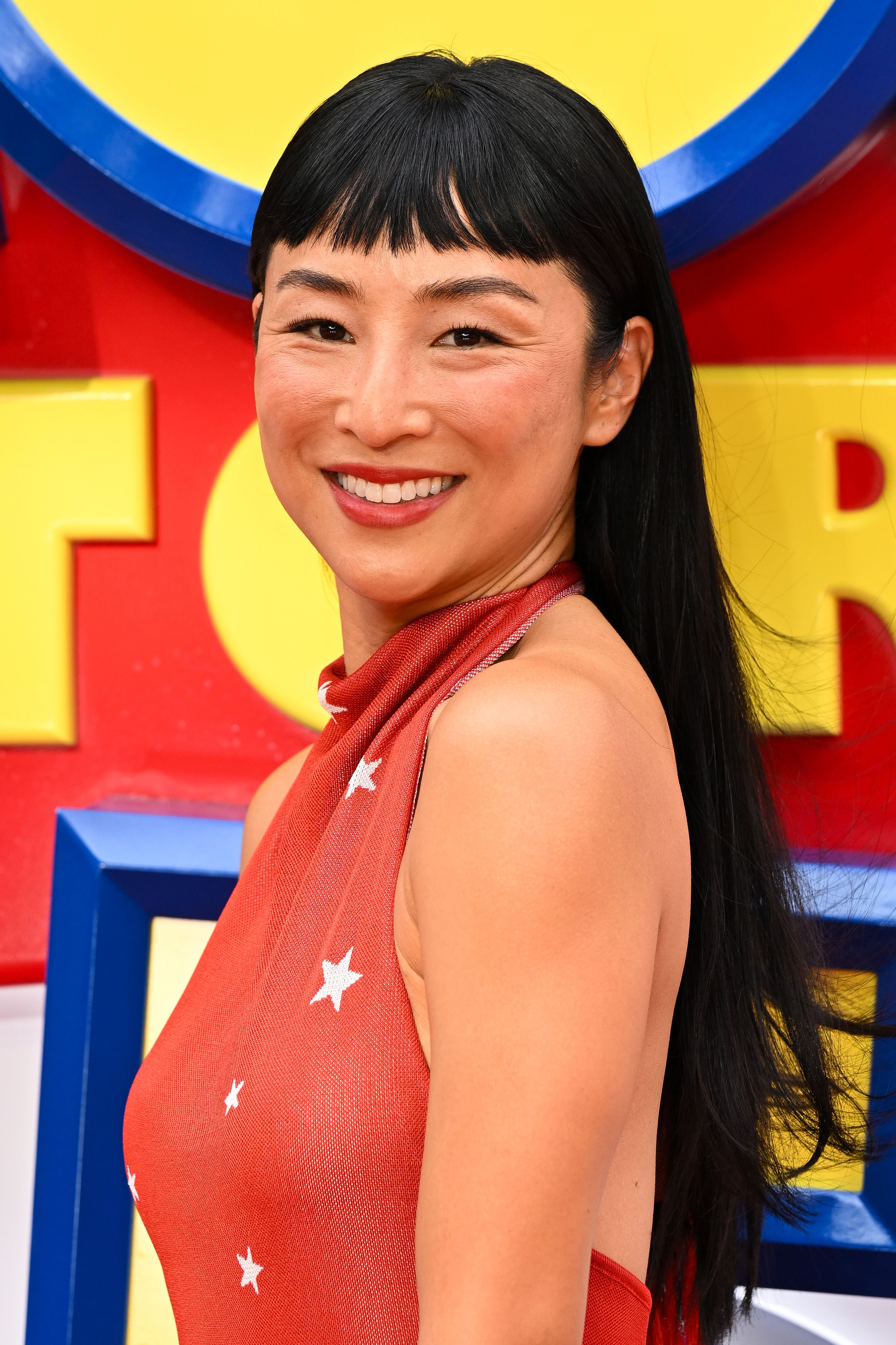 Source-feed image associated with Greta Lee Is Back on Team Bangs for Summer