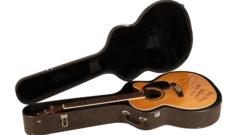Image from linked report: Oasis acoustic guitar sells for record price