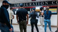 Source-feed image associated with US to revoke visas of short-term visitors seeking asylum