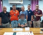 Source-feed image associated with Image of Thai police in sparkly dresses with handcuffed suspect turns out to be AI fake