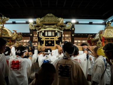 Source-feed image associated with Centuries-old festival brings Shinto traditions and towering floats to the streets