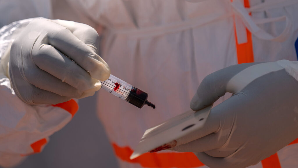 Source-feed image associated with Ebola outbreak nears milestone, while a vaccine remains months away