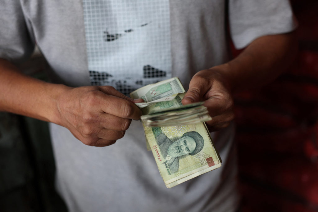 Image from linked report: Iran's currency hits a new record low as war erodes the country's economic stability