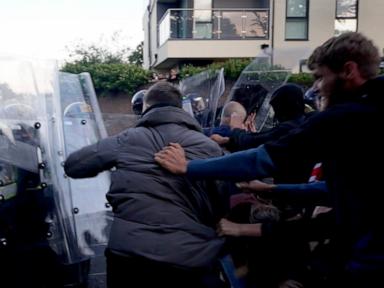 Source-feed image associated with UK government condemns violence at protest over teen's stabbing death