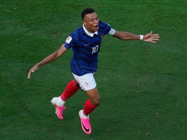 Source-feed image associated with Mbappé scores twice to tie Messi for World Cup lead with 6 goals