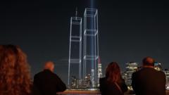 Source-feed image associated with Drone display recreates the Twin Towers over New York City